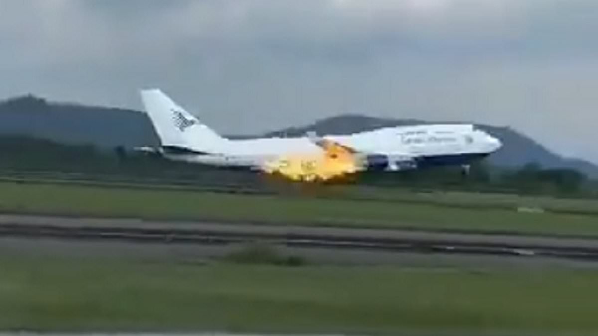 Moment flames shoot from the back of a Boeing 747 carrying 468 passengers in Indonesia in latest troubling incident for plane-making giant – amid fears safety crisis could spark jet shortage and hit holiday getaways [Video]
