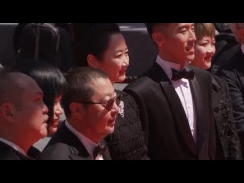 Director Jia Zhang-Ke premieres his latest film ‘Caught By The Tides’ at Cannes Film festival [Video]